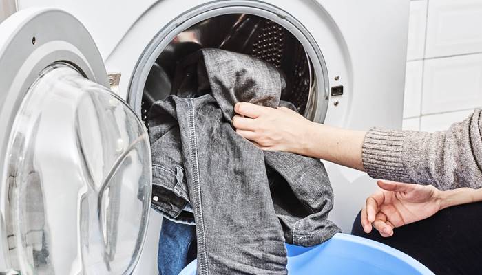 Cho quần áo vượt quá khối lượng quy định Cho quần áo vượt quá khối lượng quy định