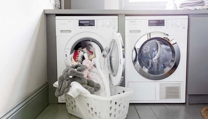 Quần áo trong lồng giặt không đều hoặc bị quá tải Quần áo trong lồng giặt không đều hoặc bị quá tải